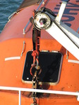 SX03027 Detail of crane holding orange lifeboat.jpg
